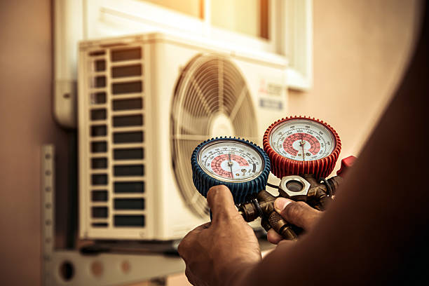 Professional Heat Pump Repair technician working in Tooele, UT